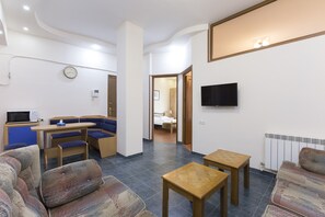 City Apartment, 2 Bedrooms | Living area | 32-inch flat-screen TV with satellite channels, TV - Umba Apartment N1 (Yerevan)