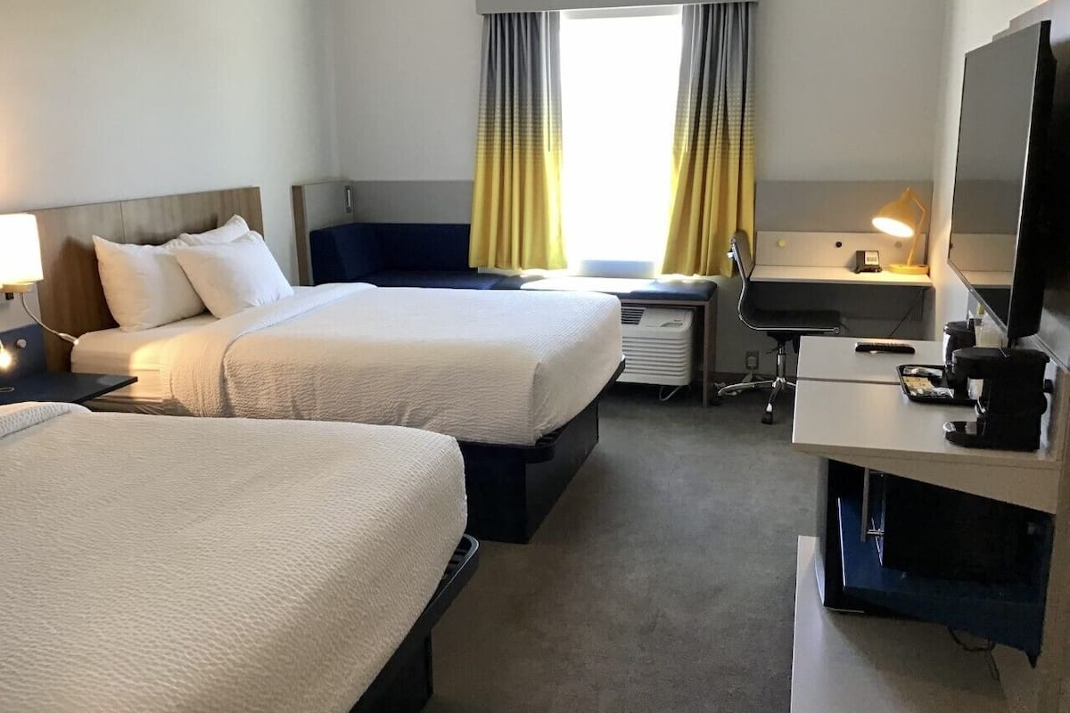 hypo-allergenic bedding, individually decorated, desk, laptop workspace