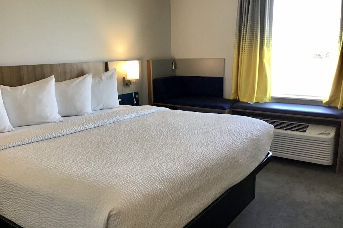 hypo-allergenic bedding, individually decorated, desk, laptop workspace