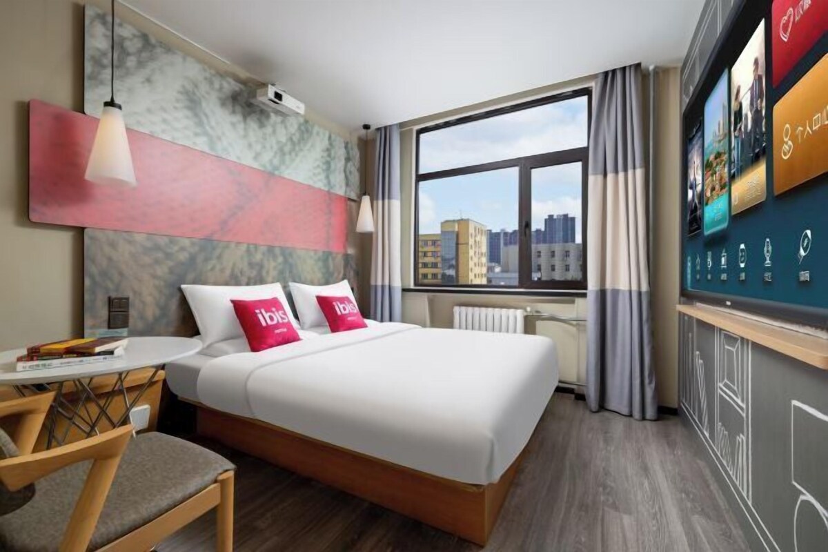 Premium bedding, desk, laptop workspace, blackout curtains