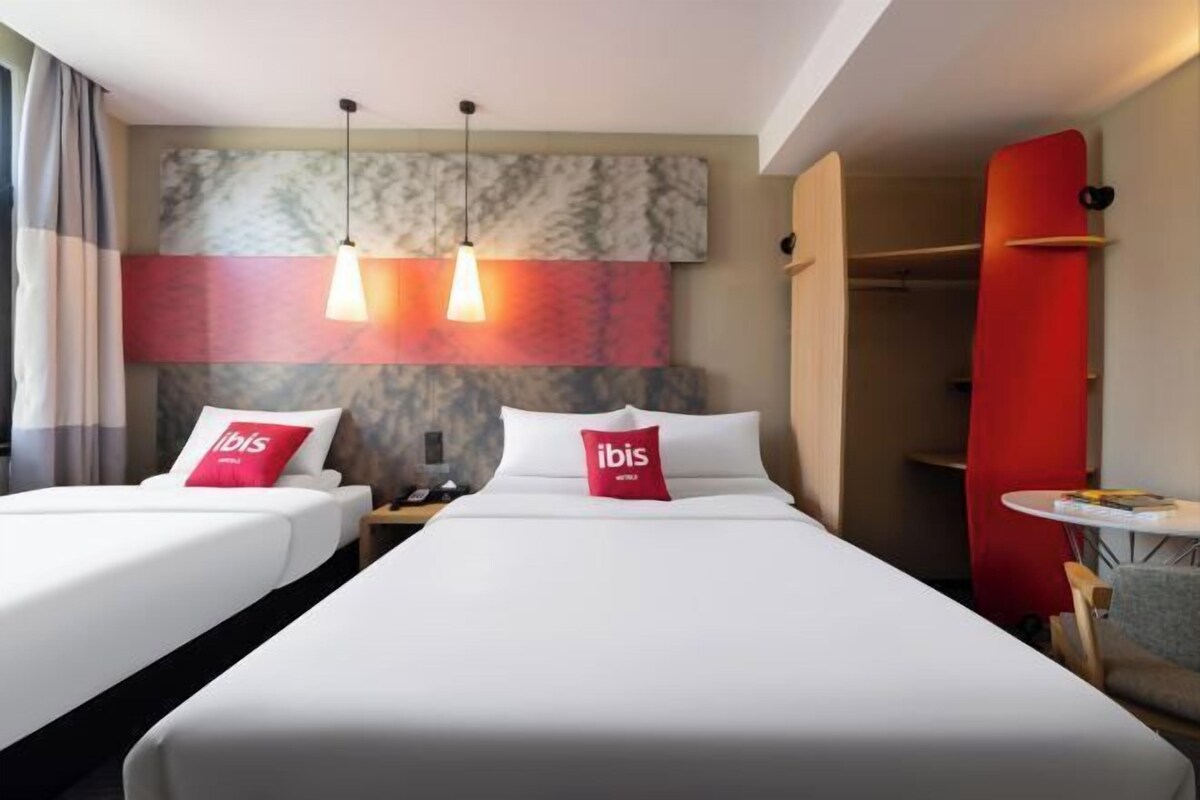Premium bedding, desk, laptop workspace, blackout curtains