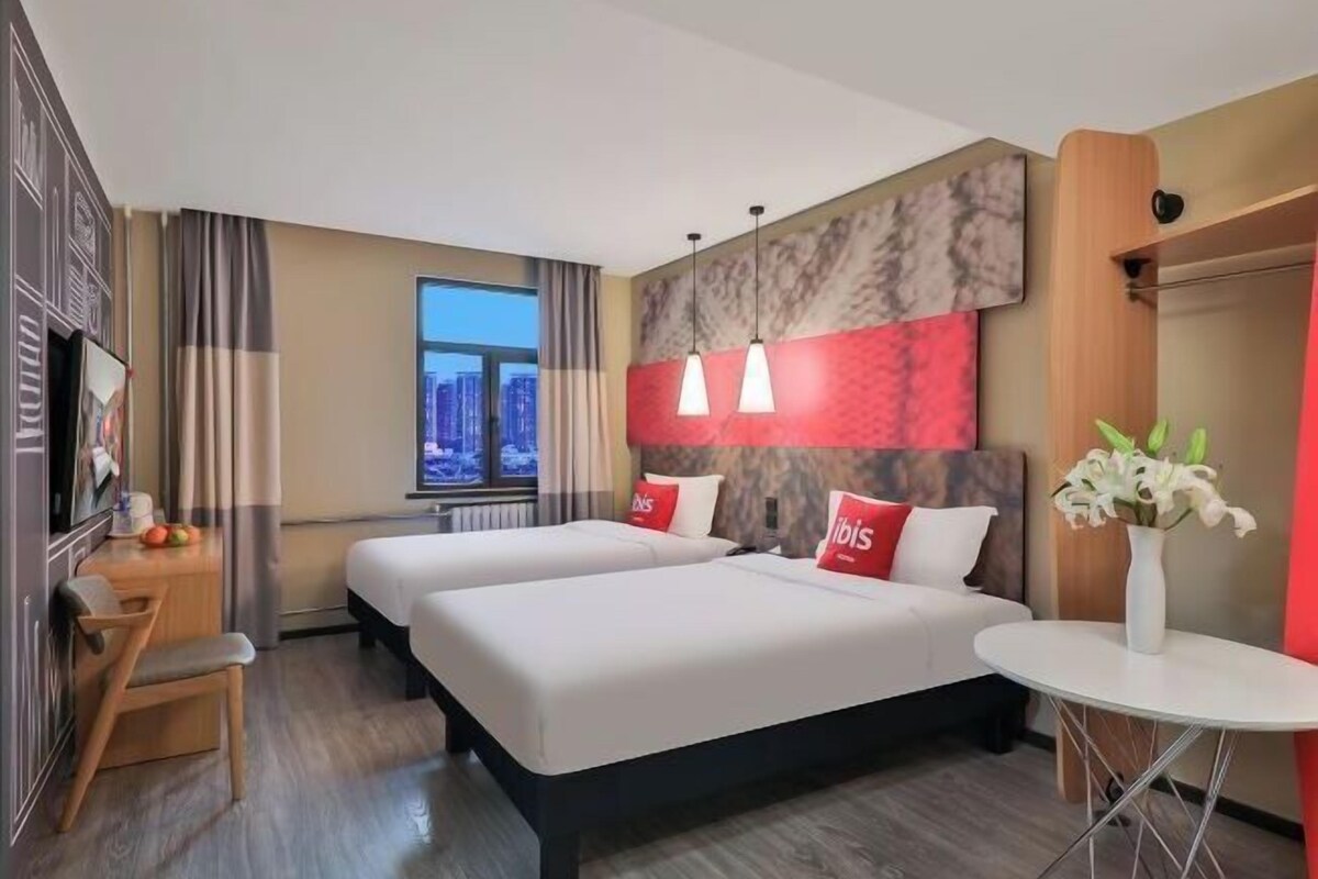 Premium bedding, desk, laptop workspace, blackout curtains