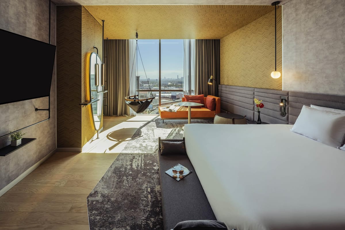 Superior Suite, 1 King Bed | Minibar, in-room safe, desk, laptop workspace