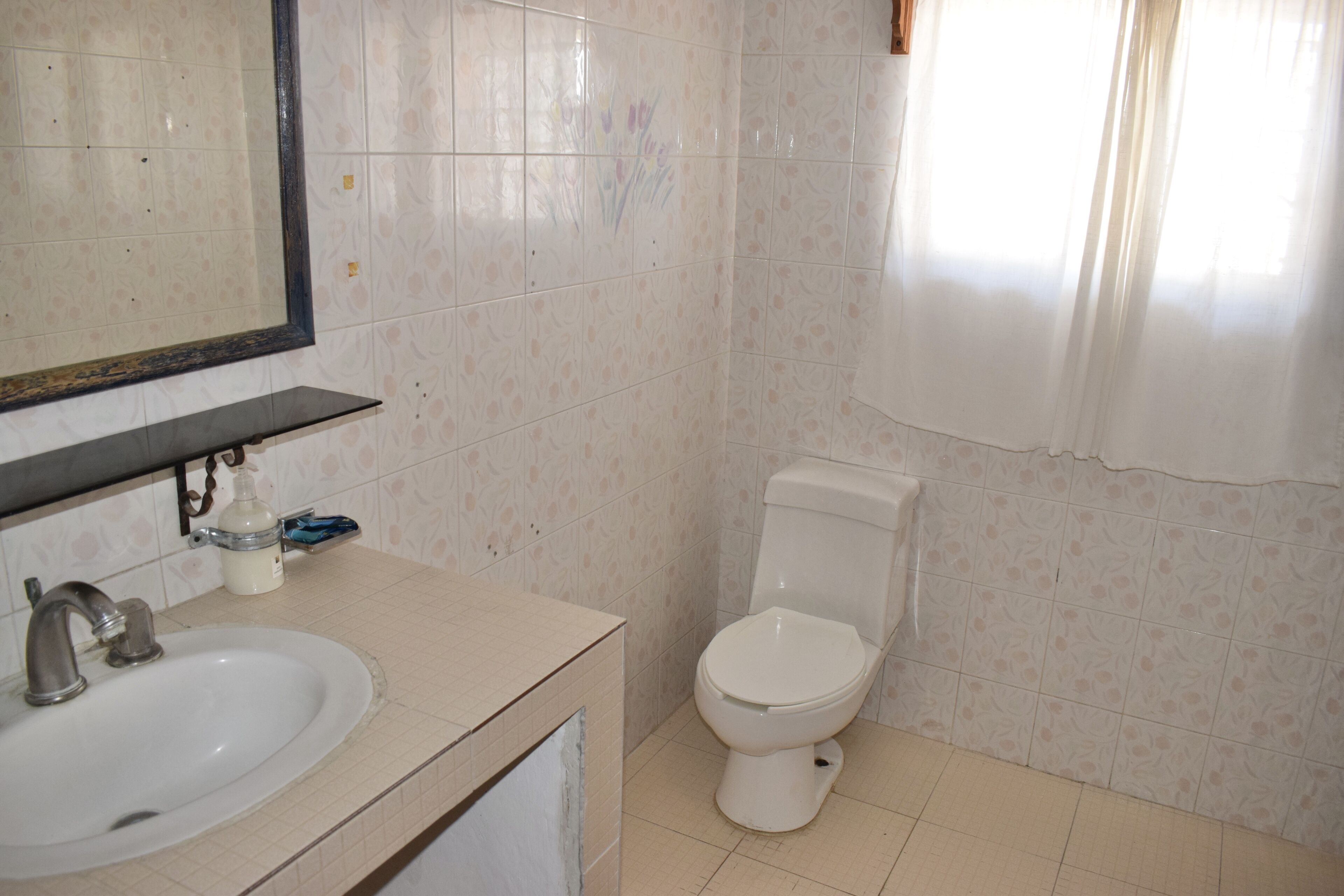 family room, multiple beds | bathroom | shower, towels