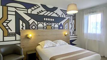 Premium bedding, memory foam beds, in-room safe, laptop workspace