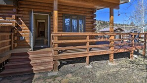 A wooden cabin with a porch, steps leading to the entrance, and a view of the surrounding landscape. - Cabin by Rio Grande - 19 Mi to Wolf Creek! (South Fork)