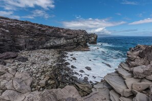 A rocky coastline with waves crashing against the shore. - Kapalua Bay Villa 34B3 Corner Ocean View Villa (Lahaina)