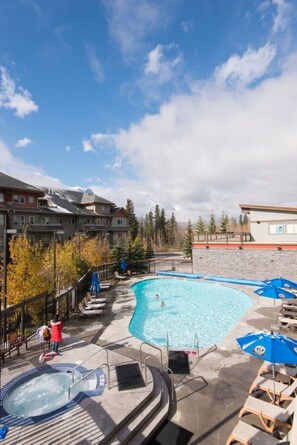 Outdoor pool, a heated pool - Immaculate 2Bdr Condo- Perfect Mountain Getaway  (Canmore)