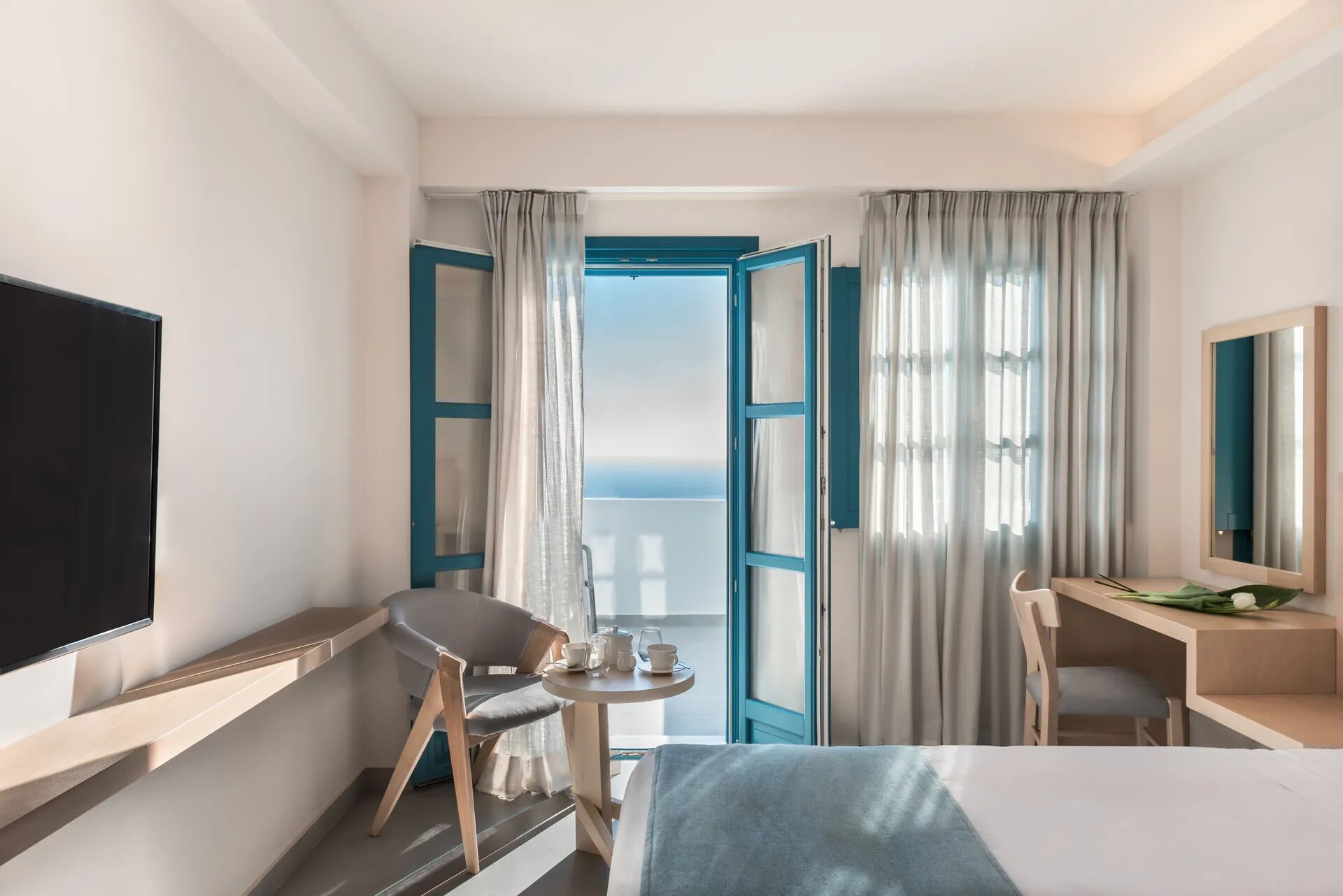 room (caldera panorama) | minibar, in-room safe, desk, laptop workspace