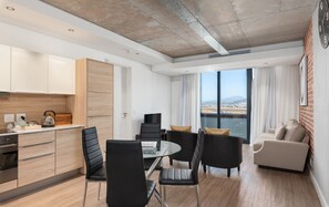 Apartment, 1 Bedroom | Living area | 32-inch flat-screen TV with satellite channels, TV - Matrix (Cape Town)