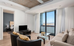 Apartment, 1 Bedroom | Living room | 32-inch flat-screen TV with satellite channels, TV - Matrix (Cape Town)