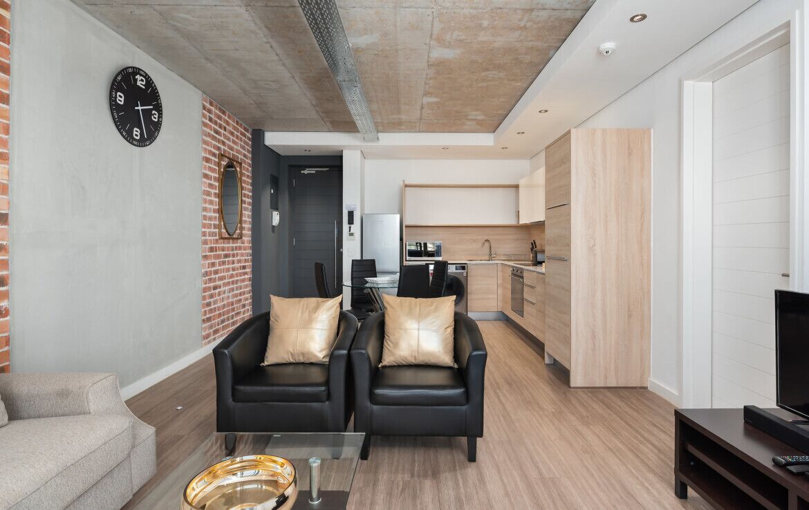 Apartamento, 1 quarto | Área de estar | TV de tela plana 32 polegadas com canais via satélite, TV