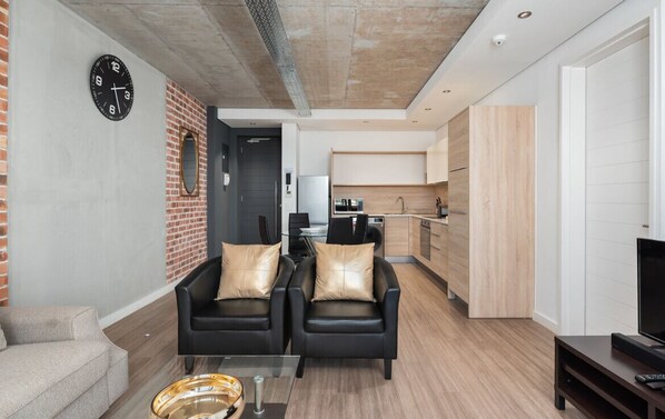 Apartment, 1 Bedroom | Living area | 32-inch flat-screen TV with satellite channels, TV - Matrix (Cape Town)