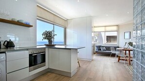 Studio (Blue Waters 2) | Private kitchen | Full-sized fridge, oven, stovetop, electric kettle - Blue Waters Studios (Cape Town)