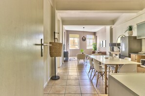 Apartment, 1 Bedroom | Living area | 32-inch flat-screen TV with satellite channels, TV