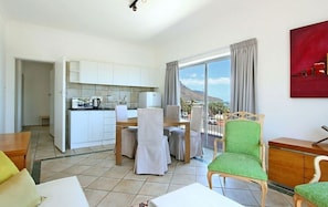Apartamento, 1 quarto, vista para o mar | Área de estar | TV
