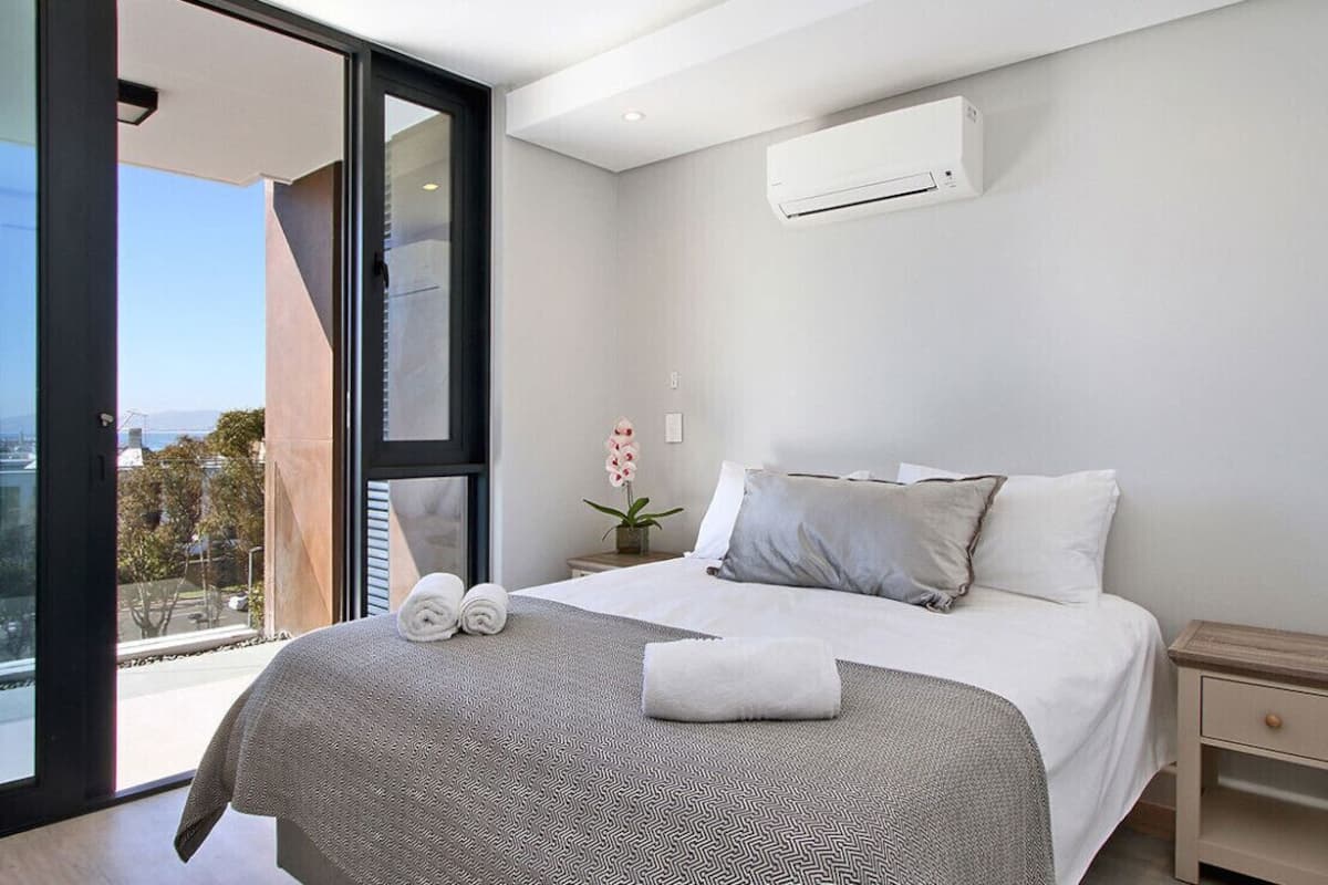 Apartment, 1 Bedroom, Sea View | 1 bedroom, blackout drapes, iron/ironing board, free WiFi