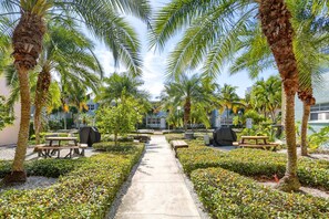 Outdoor dining - Pool, Beach Across Street, On Site Laundry, FREE Activities & Parking ~ 205D Barefoot Beach Resort (Indian Shores)