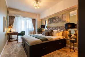 Appartement Deluxe, 2 chambres, salle de bains privée, vue ville | 2 chambres, literie de qualité supérieure, matelas mémoire de forme