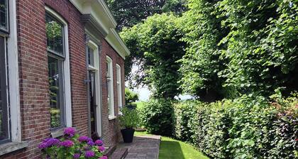 Peaceful Apartment in Ten Post With Garden