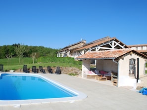 Outdoor pool, a heated pool - Cottage in France With Covered Terrace (Roussines)