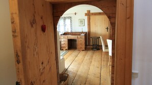 A wooden interior with a desk, chair, and cabinets. - Holiday Home in Liebenfels in Carinthia With Sauna (Liebenfels)