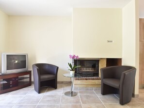 Ferienhaus | Wohnzimmer | Kamin