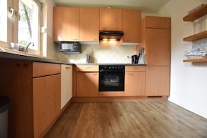 House | Private kitchen | Coffee/tea maker, highchair - Alluring Holiday Home in Reutum-Weerselo with Hot Tub (Reutum)