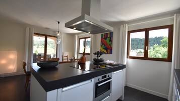 Villa | Private kitchen | Fridge, high chair