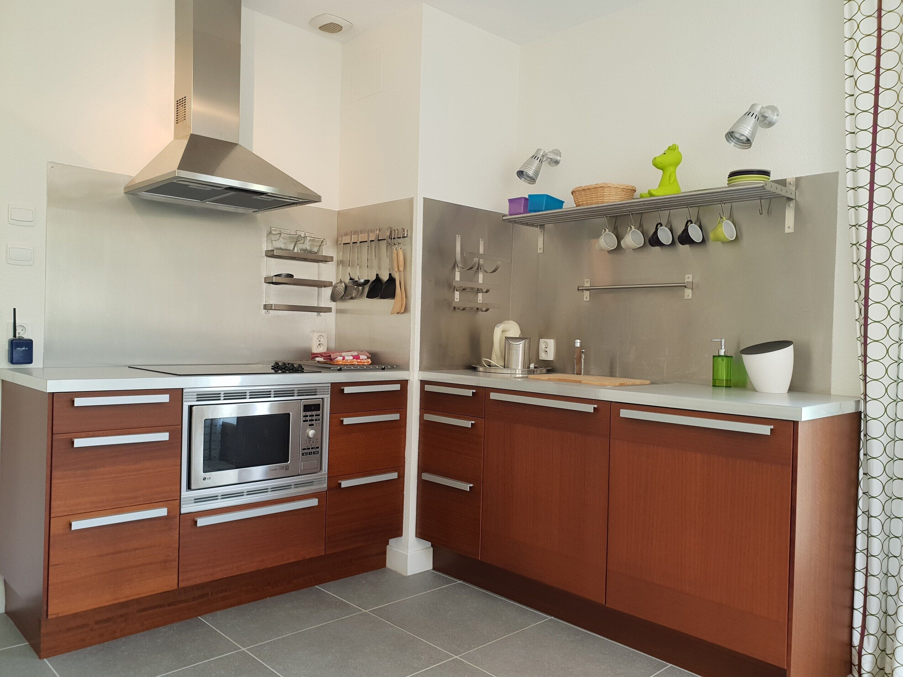Villa | Private kitchen | Fridge, high chair