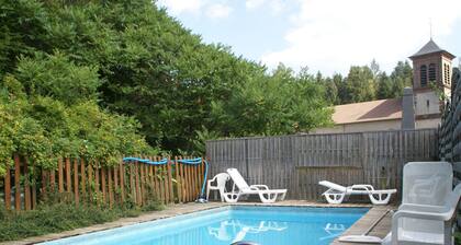 Holiday Home in the Forest With Private Swimming Pool and Playground Equipment