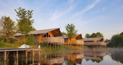 Campsite - Combined Tents With Kitchen and Bathroom Located Near a Pond
