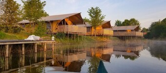 Campsite - Combined Tents With Kitchen and Bathroom Located Near a Pond