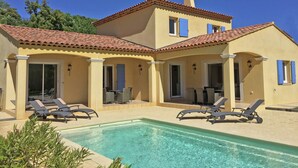 A two-story building with a swimming pool, outdoor seating, and a covered patio area. - Contemporary Villa With Pool (Plan-de-la-Tour)