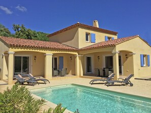 A two-story building with a swimming pool, outdoor seating, and a covered patio area. - Contemporary Villa With Pool (Plan-de-la-Tour)