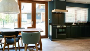 Villa | Private kitchen | Coffee/tea maker, fridge, microwave, dishwasher - Beautiful Designed Sauna Villa, in National Park De Hondsrug (Exloo)