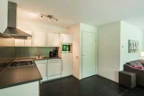House | Private kitchen | High chair - Holiday Home in Balk Near Frisian Lakes (Balk)