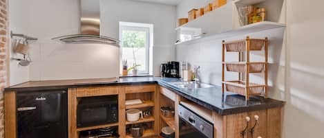 Appartement | Cuisine privée | Chaise haute