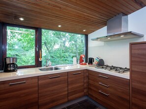 House | Private kitchen | Fridge - Bungalow in Nes on Ameland With Spacious Terrace (Nes)