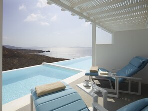 Premium Suite, Private Pool, Sea View | Egyptian cotton sheets, premium bedding, memory foam beds, minibar