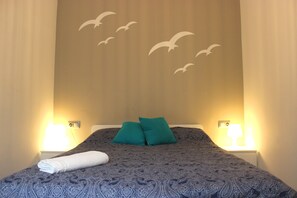 2 habitaciones, tabla de planchar con plancha, cuna de viaje y wifi 