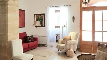 TV, fireplace, books, stereo