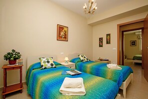 Family Apartment, 2 Bedrooms (Villa Mimosa - Appartamento 2) | 2 bedrooms, iron/ironing board, bed sheets