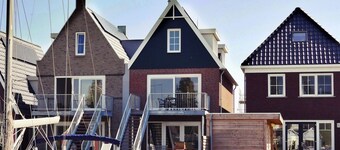 Modern house with high terrace & garden on private canal & jetty