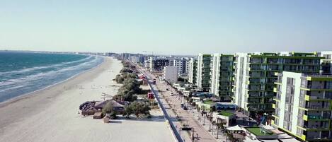 On the beach, sun loungers
