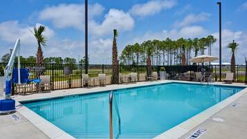 Outdoor pool, open 8:00 AM to 10:00 PM, pool loungers