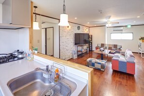 3 Bedrooms Apartment | Living area | Flat-screen TV - Wind Makiminato (Urasoe)