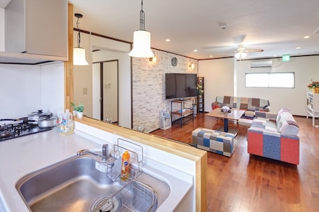 3 Bedrooms Apartment | Living area | Flat-screen TV