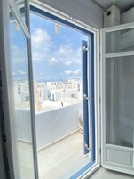 Junior Suite, Balcony, City View | Premium bedding, minibar, in-room safe, soundproofing