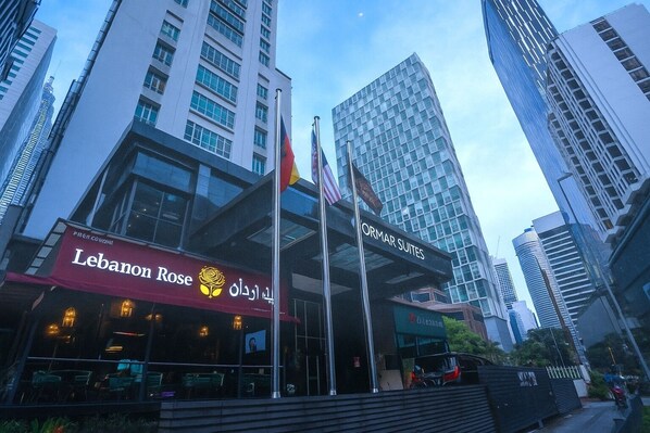 A modern building with a sign for 'Lebanon Rose' and 'Formar Suites'. - Cormar Suites Kuala Lumpur (Kuala Lumpur)